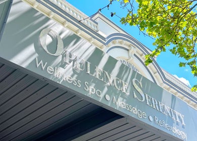 Opulence Serenity signage under blue sky at Subiaco, Western Australia, AU wellness spa, massage, and reflexology.