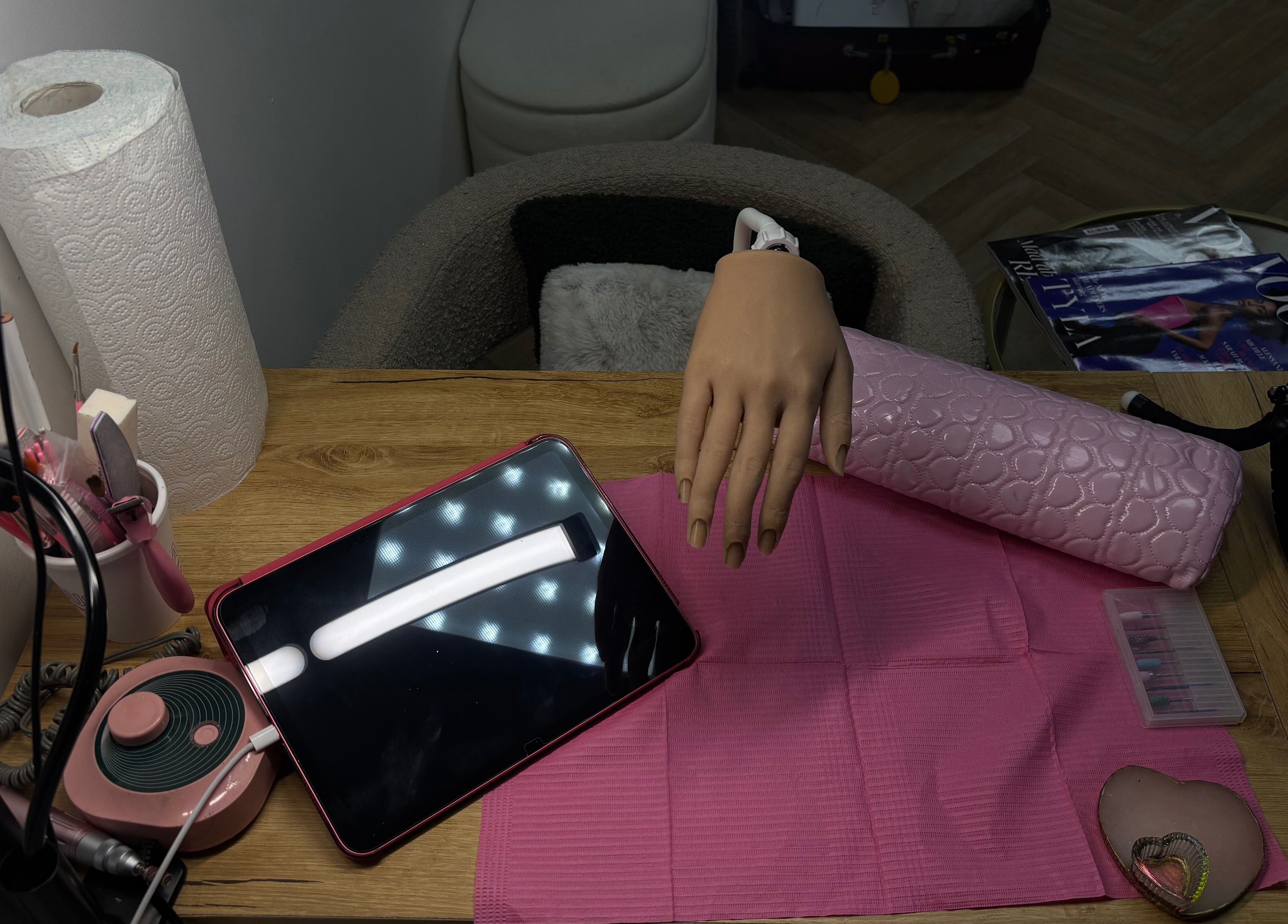 Nail setup at JenellaNailedIt, London, England, GB showcasing tools and workspace for manicures.