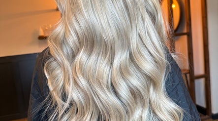 Wavy blonde hair captured at Aphrodite, Stirling, Scotland, GB.