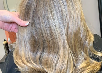 Blonde hair styled in waves at Hair by Hannah, Bentley Heath, England, GB.