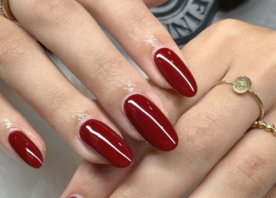 Bright red manicured nails at Scarlett Nails Studio in Dee Why, New South Wales, AU, showcasing elegance.