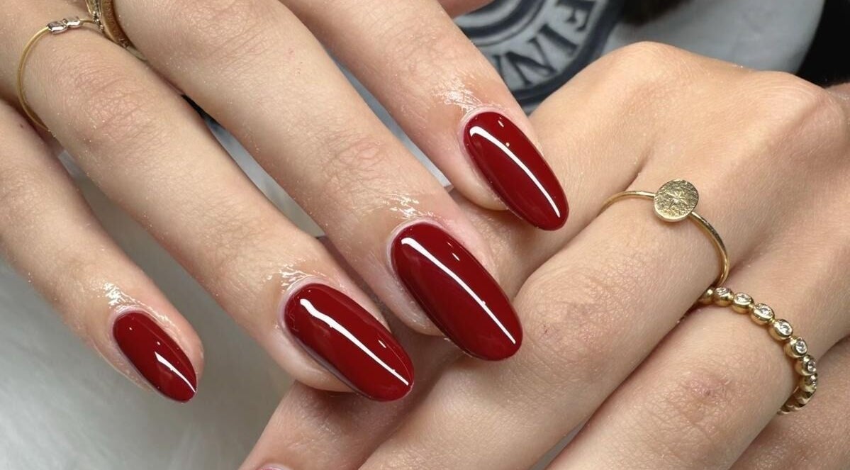 Bright red manicured nails at Scarlett Nails Studio in Dee Why, New South Wales, AU, showcasing elegance.