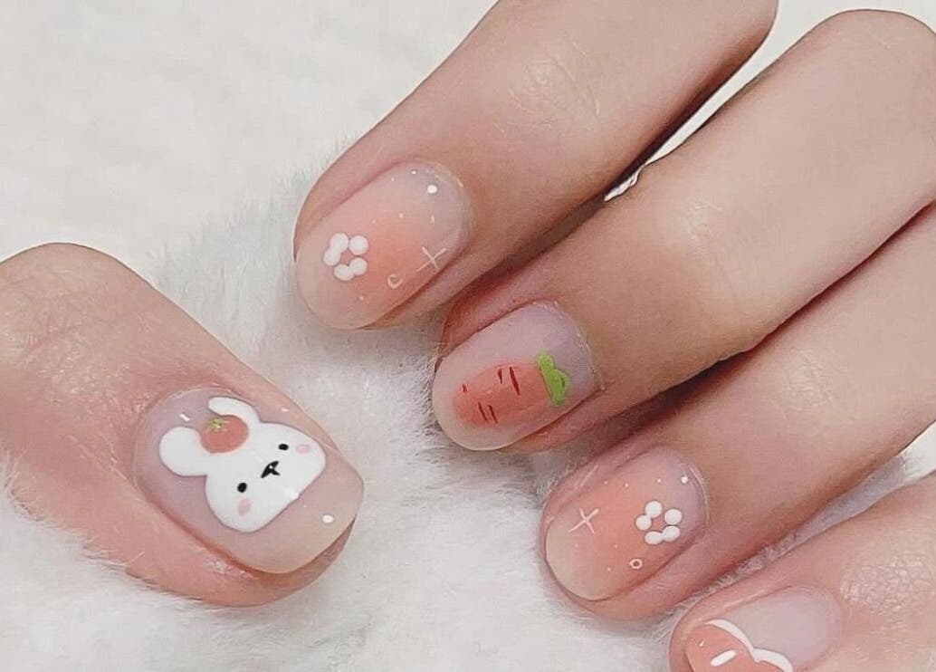 Cute nail art featuring animal designs at Scarlett Nails Studio, Dee Why, New South Wales, AU.