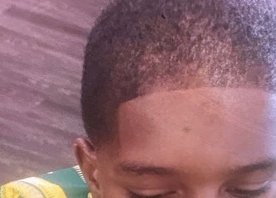 Close-up of a clean haircut at Faded Barbershop in Detroit, Michigan, US showcasing expert grooming.