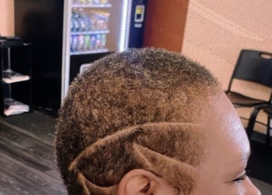 Stylish haircut with precise lines at Faded Barbershop, Detroit, Michigan, US.