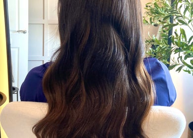 Long, flowing hair in a serene salon at SAW Hair Extensions, Nottingham, England, GB.