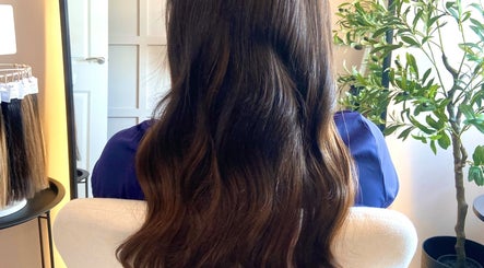 Long, flowing hair in a serene salon at SAW Hair Extensions, Nottingham, England, GB.
