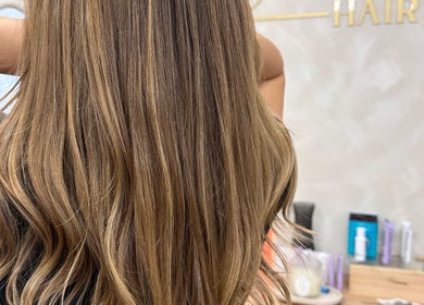 Luscious wavy hair styled at Kelseigh Walsh Hair - Studio in Anstey, England, GB.