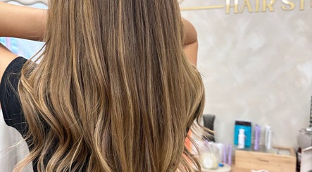 Luscious wavy hair styled at Kelseigh Walsh Hair - Studio in Anstey, England, GB.