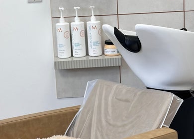 Modern wash station at Kelseigh Walsh Hair - Studio in Anstey, England, GB featuring premium hair products.