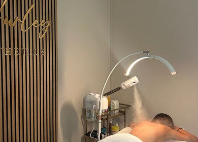 Relaxing spa treatment room at Hurley Aesthetics, Blaxton, England, featuring tranquil lighting.
