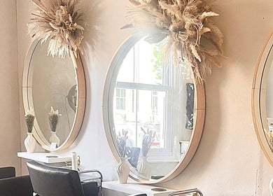 Chic salon mirrors at H Derma Beauti Aesthetics & Hair, Norwich, England, GB. Modern elegance and style.
