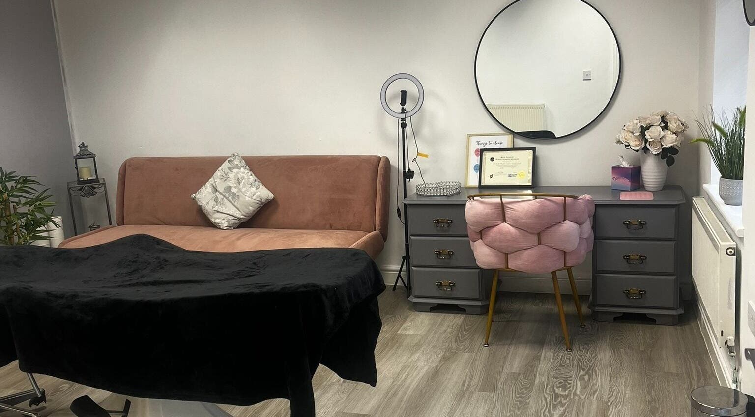 Elegantly designed beauty room at Timeless Cosmetics, King's Lynn, England, GB, featuring a plush sofa and modern decor.