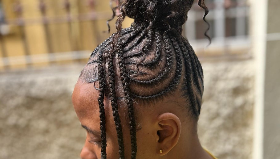 Intricate braided hairstyle at Tressed_bybrit, Montego Bay, St. James Parish, JM highlights unique styling.