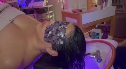 Client enjoys a rejuvenating facial treatment at B&G Wellness Salon, Roswell, Georgia, US.
