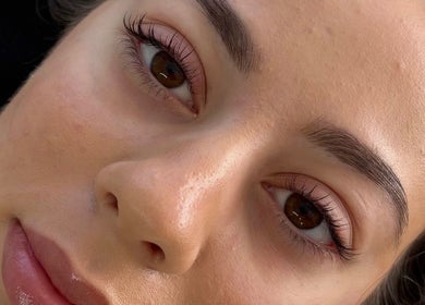 Close-up of glowing skin and brows at Enhance Beauty, Albion Park Rail, New South Wales, AU.