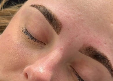 Close-up of perfectly shaped eyebrows at Enhance Beauty, Albion Park Rail, New South Wales, AU.