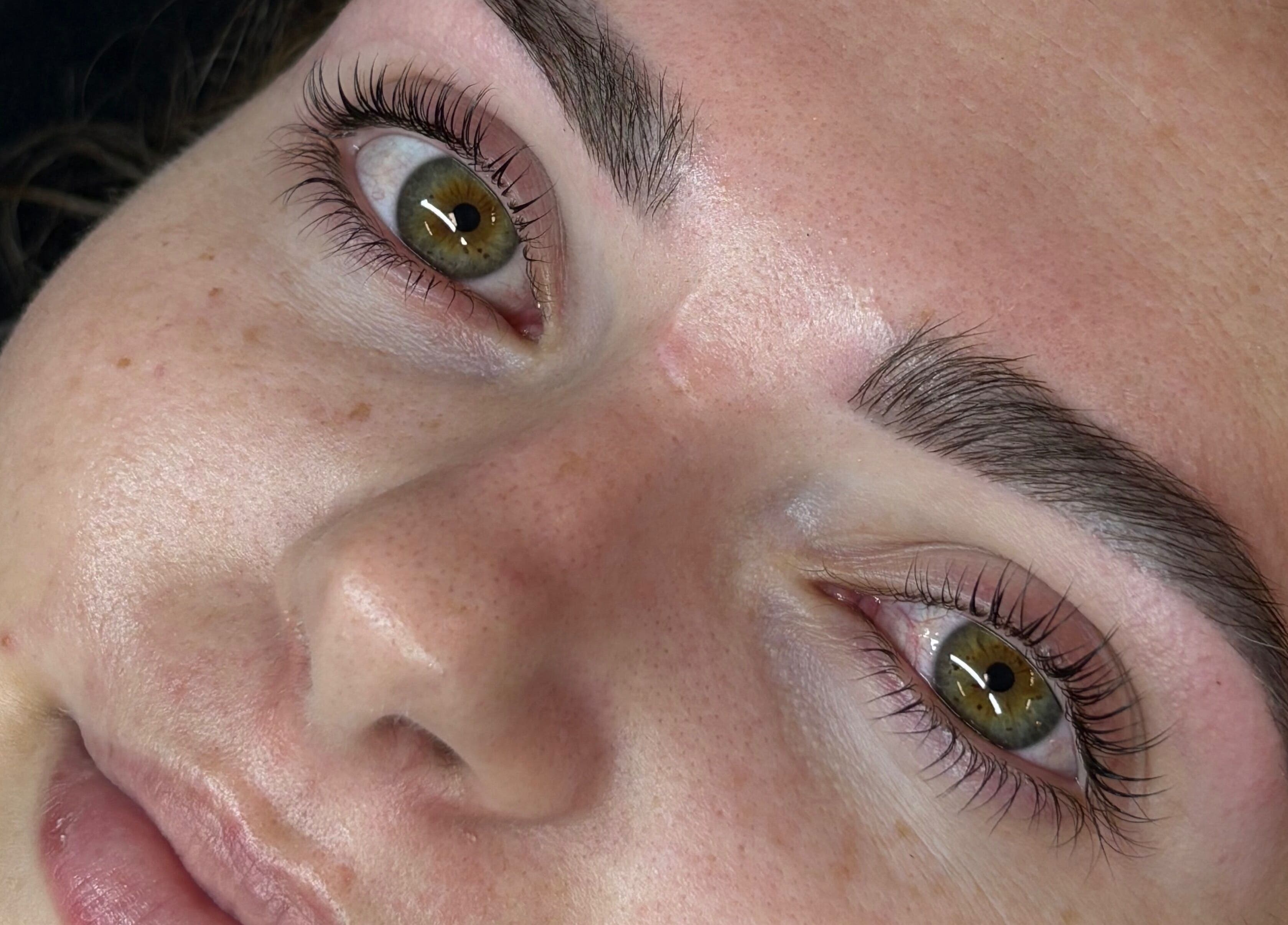 Close-up of expertly shaped brows at Enhance Beauty, Albion Park Rail, New South Wales, AU.