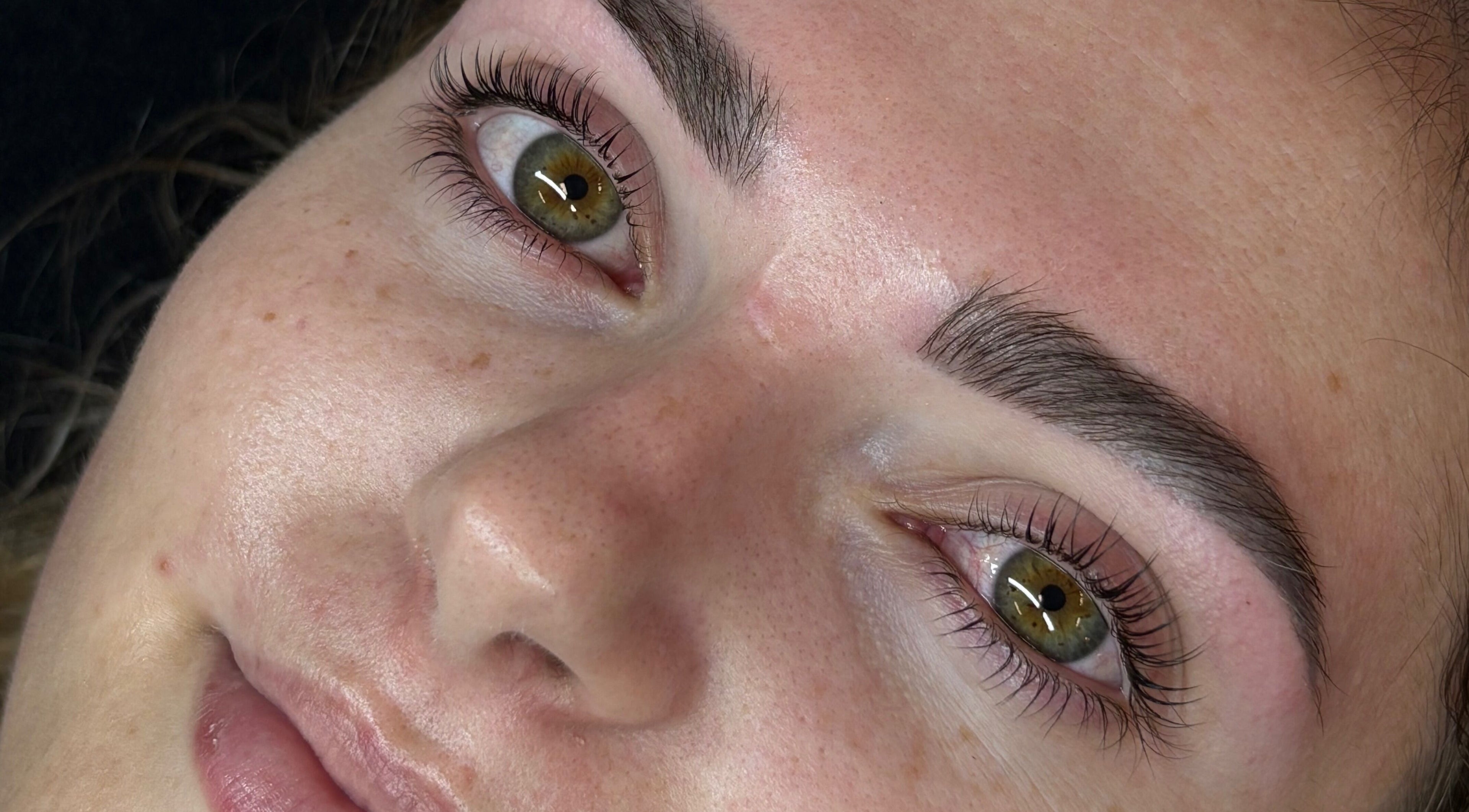 Close-up of expertly shaped brows at Enhance Beauty, Albion Park Rail, New South Wales, AU.