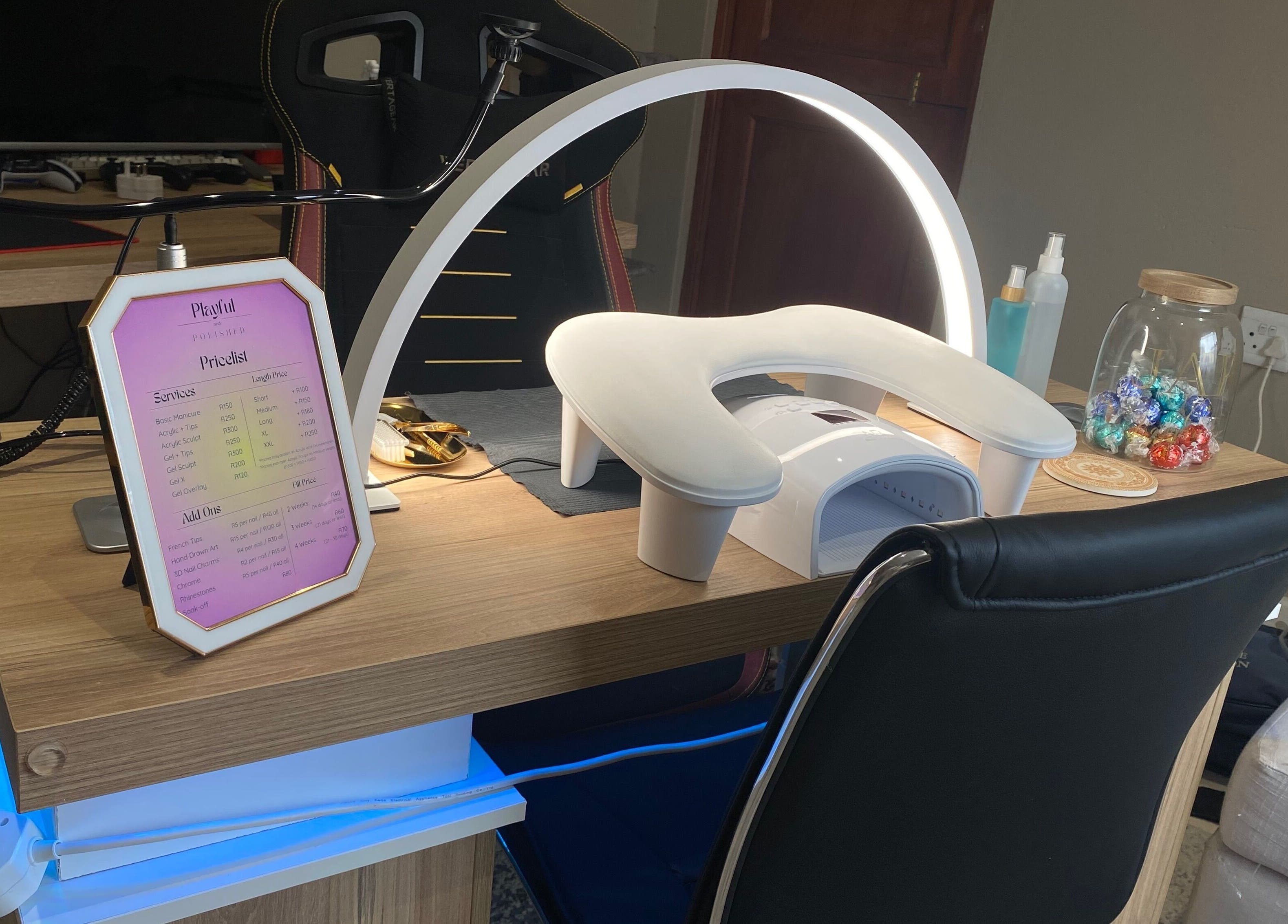 Modern nail setup at Playful and Polished, Randburg, Gauteng, ZA, featuring a sleek manicure table.