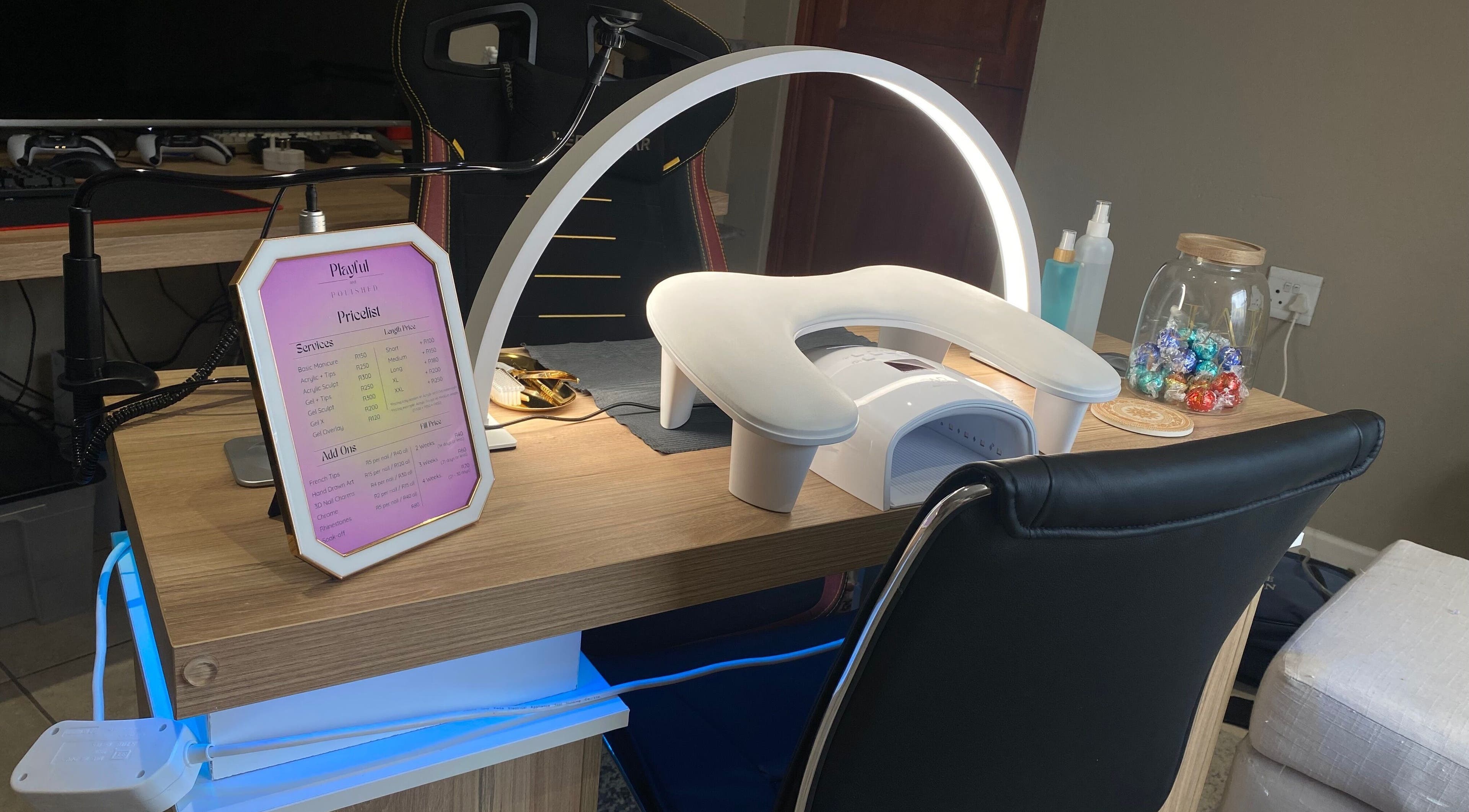 Modern nail setup at Playful and Polished, Randburg, Gauteng, ZA, featuring a sleek manicure table.