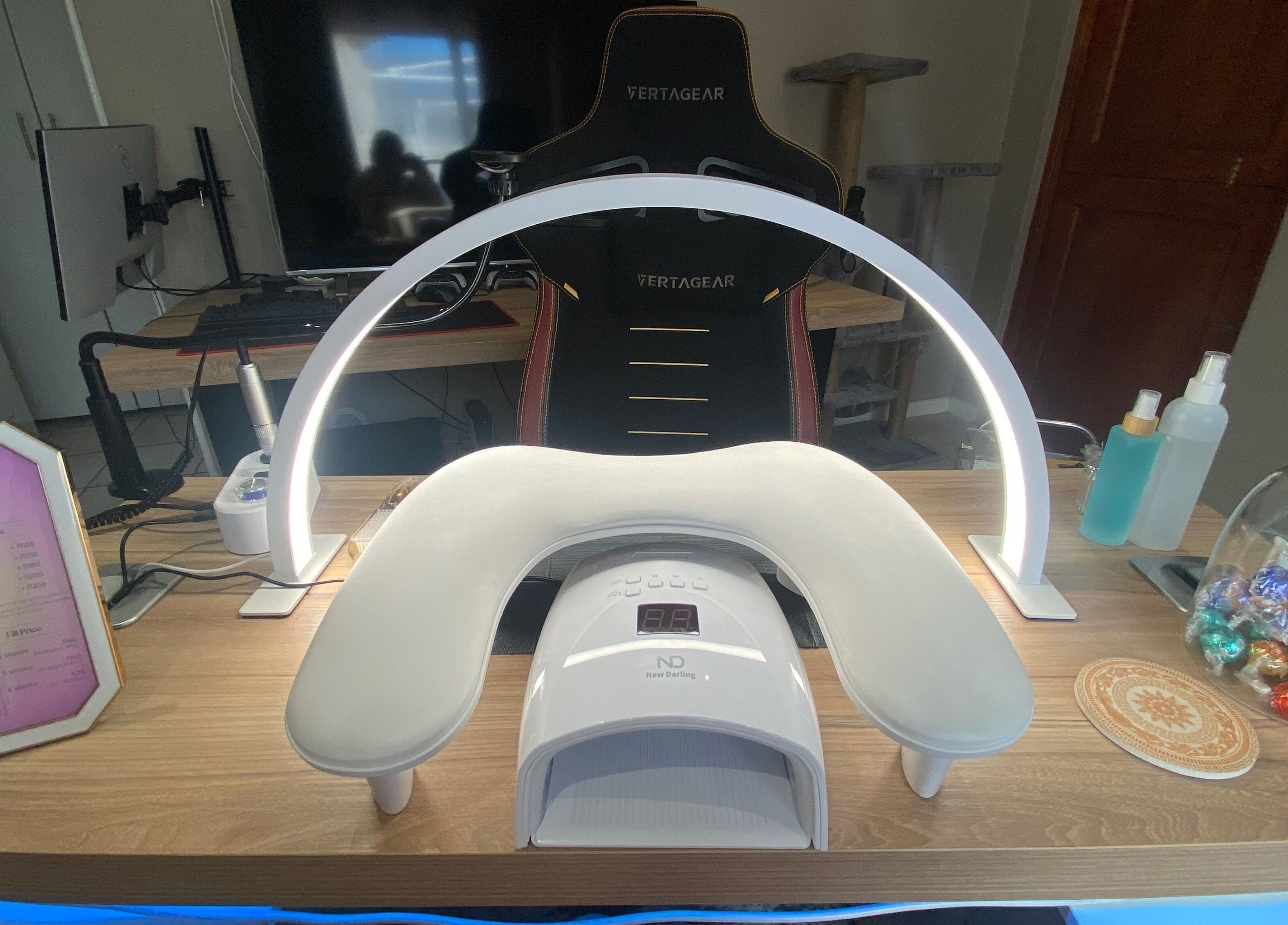 Nail treatment station at Playful and Polished in Randburg, Gauteng, ZA, showcasing modern nail care setup.