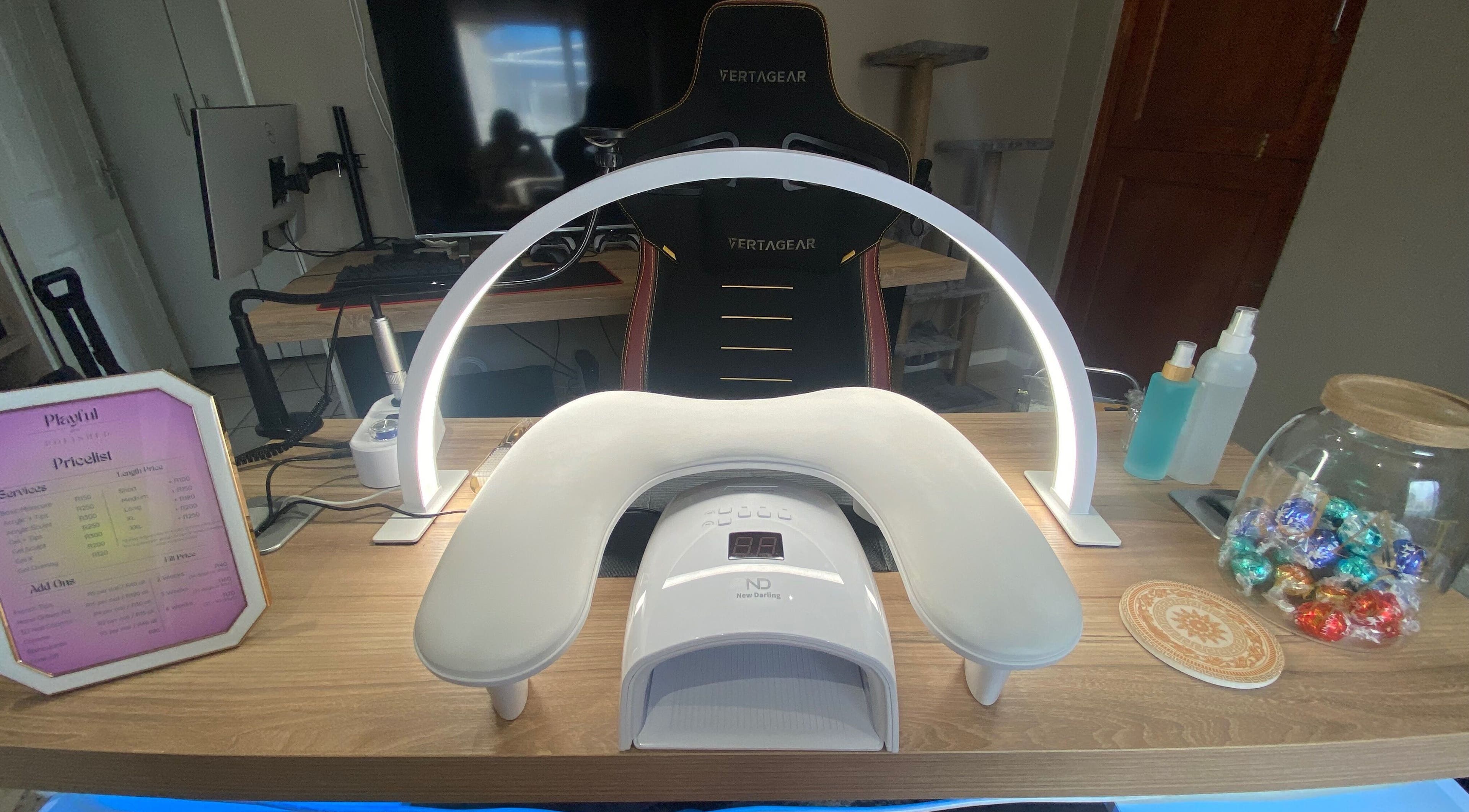 Nail treatment station at Playful and Polished in Randburg, Gauteng, ZA, showcasing modern nail care setup.