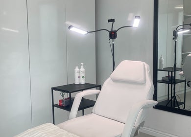 Modern treatment room at Dr. Allison Aesthetics in Cape Town, Western Cape, ZA with sleek white decor.