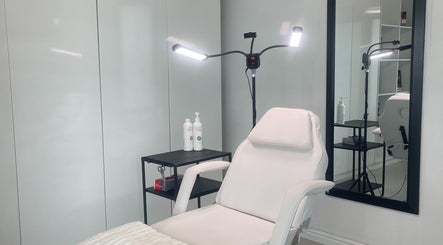 Modern treatment room at Dr. Allison Aesthetics in Cape Town, Western Cape, ZA with sleek white decor.