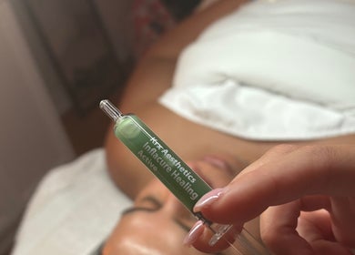Close-up of a treatment vial at VitaGlow Esthétiques in Laval, Québec, CA, highlighting skincare rejuvenation.