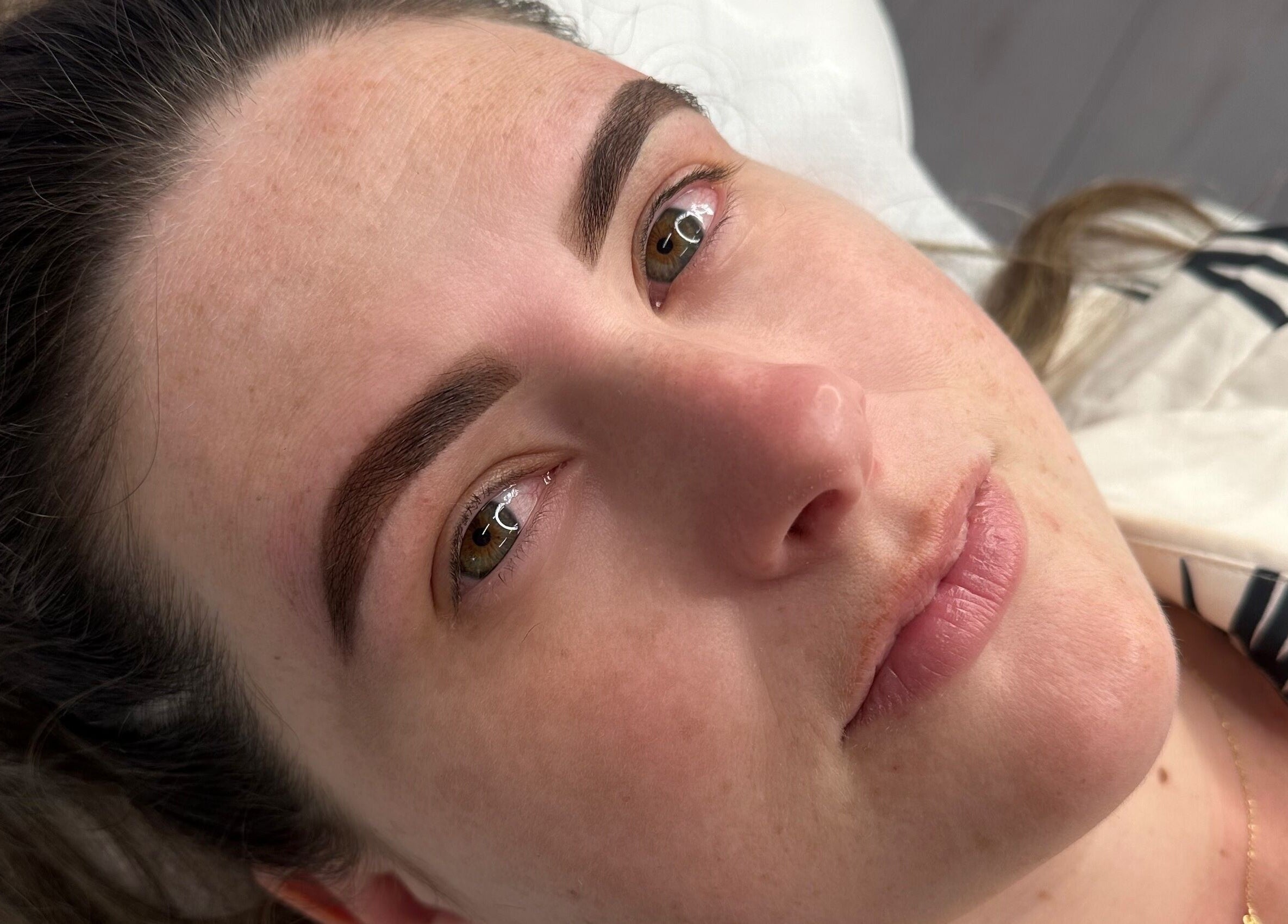 Close-up of woman with styled eyebrows at Maddison Beauté Collective, Coventry, England, GB.