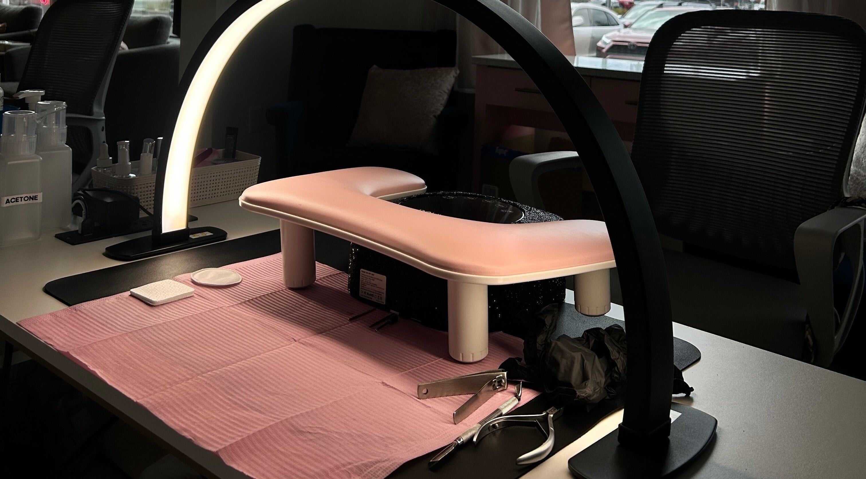 Nail station setup at 11:11 Nails By Jordan, Dalton Gardens, Idaho, US with manicure tools and lighting.