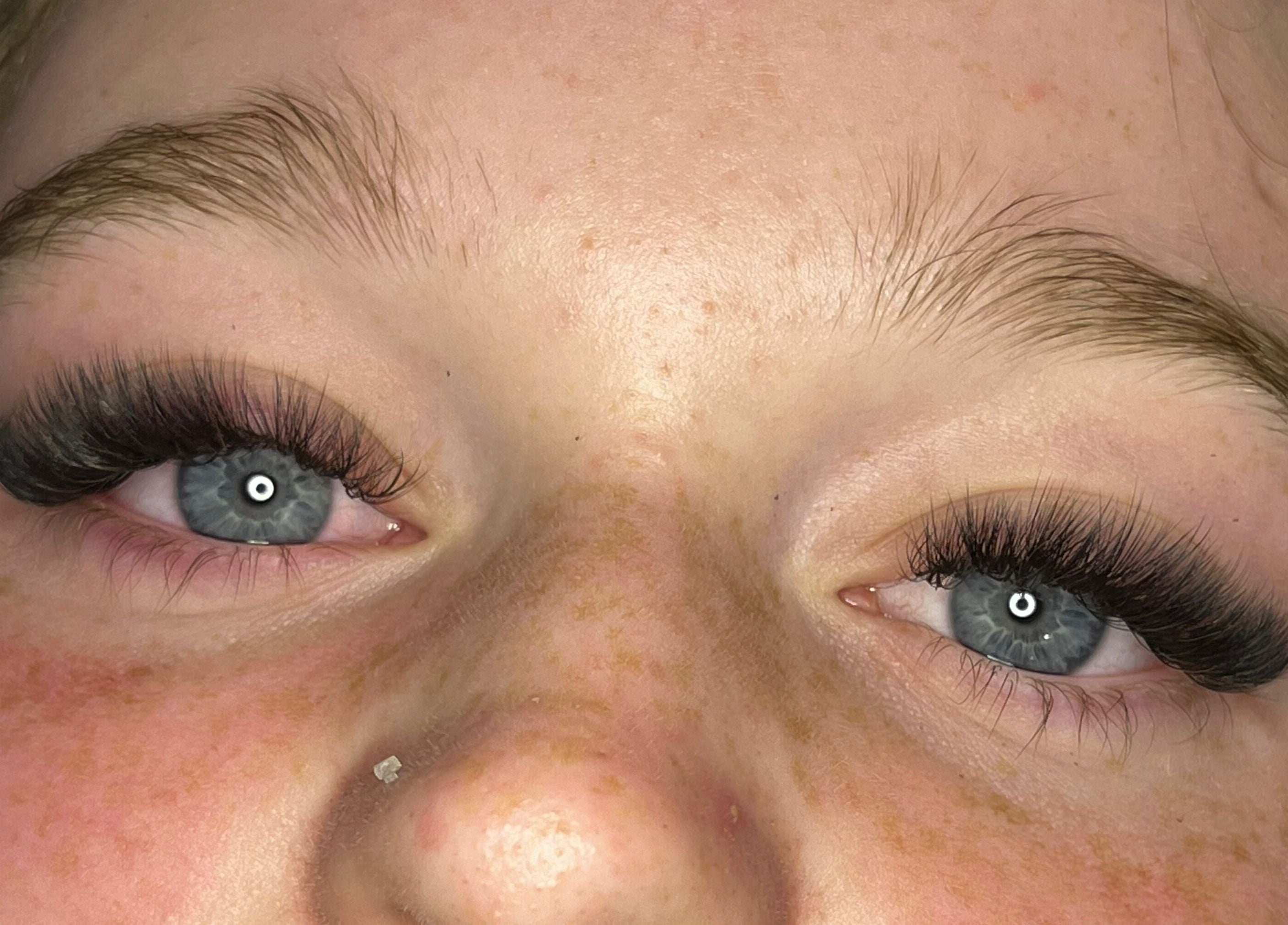 Closeup of eyelash extensions by Lashes by Lydia in Pickering, England, GB, showcasing detailed lash craftsmanship.