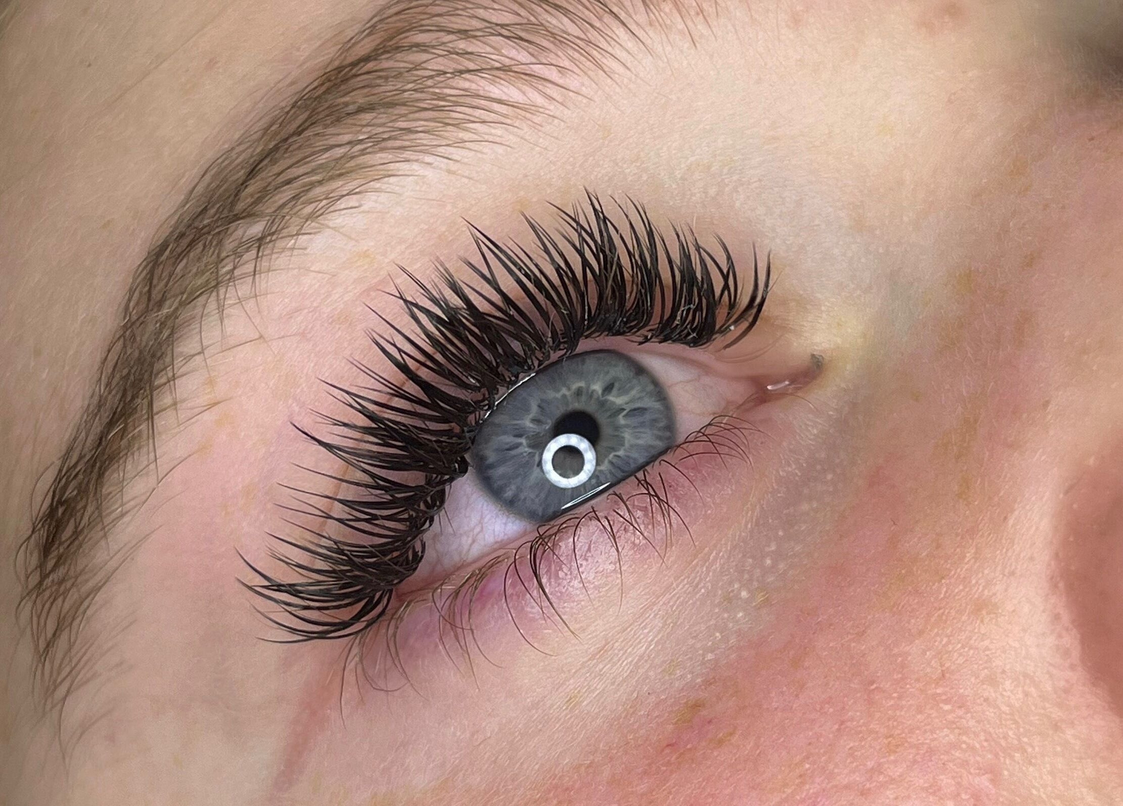 Close-up of eye with full lashes by Lashes by Lydia, Pickering, England, GB.