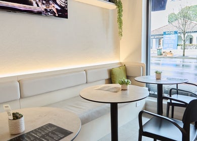 Modern seating area at Vita Health Club, North Willoughby, New South Wales, AU with chic decor.