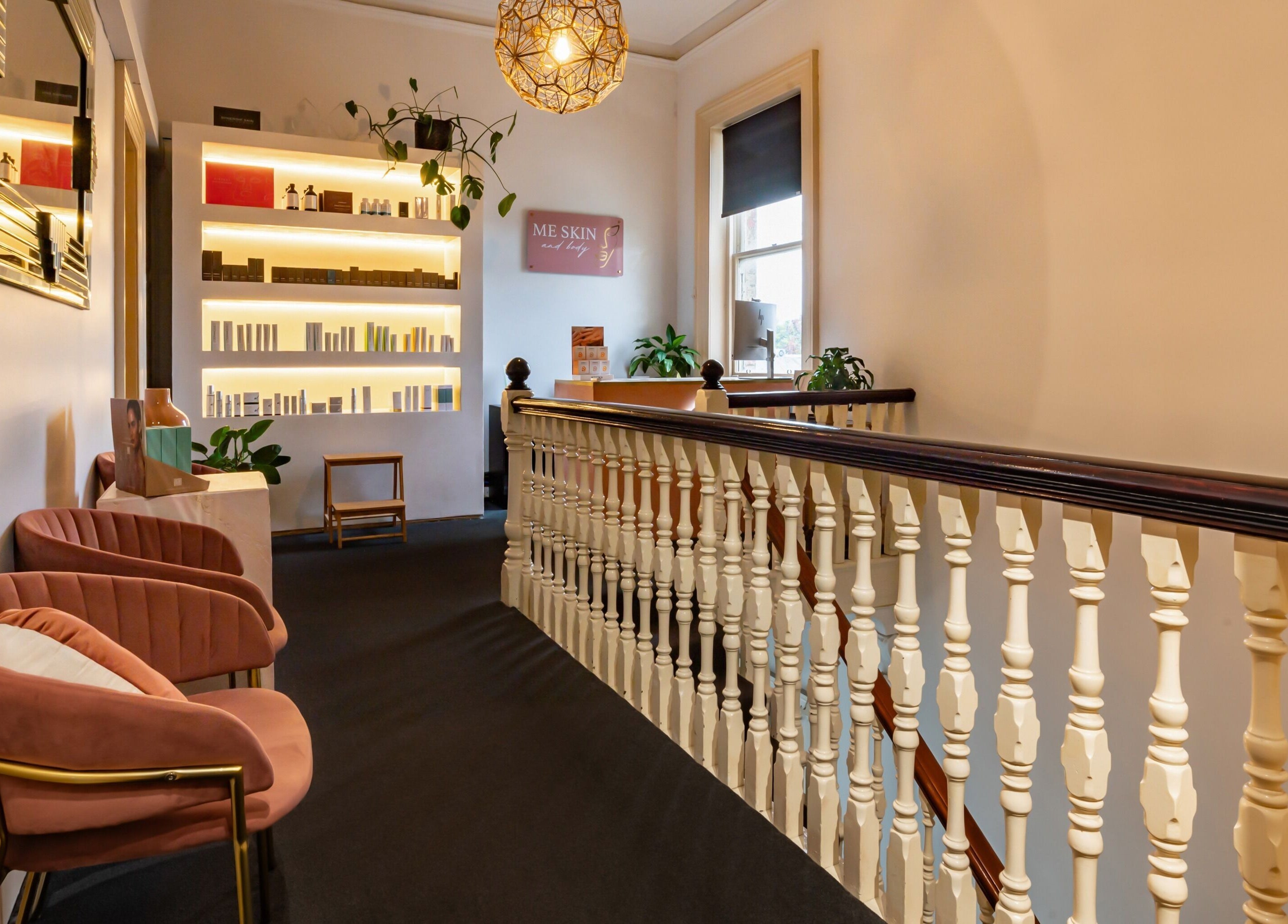 Elegant lounge area at Me Skin and Body, Melbourne, Victoria, AU showcasing modern decor and cozy seating.