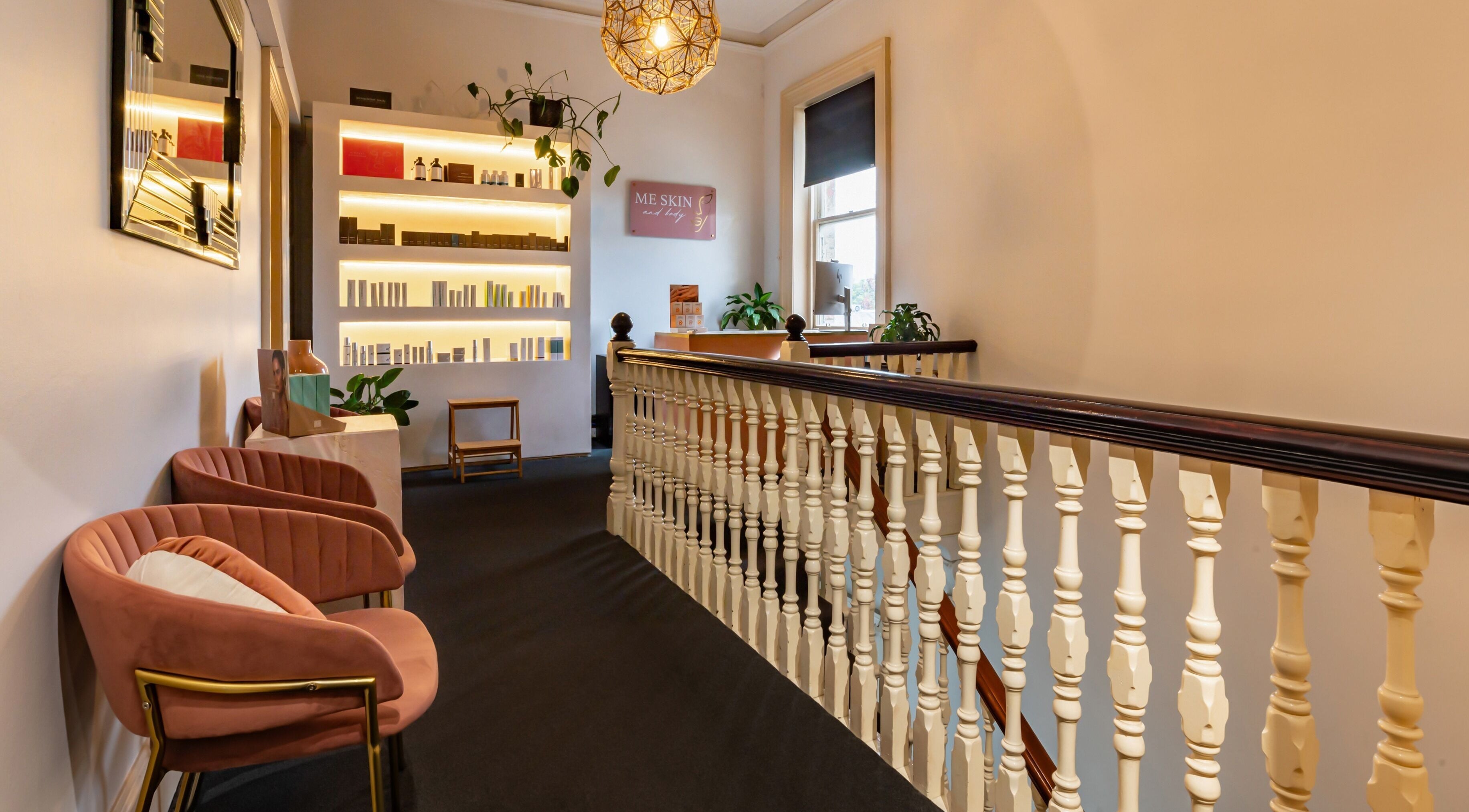 Elegant lounge area at Me Skin and Body, Melbourne, Victoria, AU showcasing modern decor and cozy seating.
