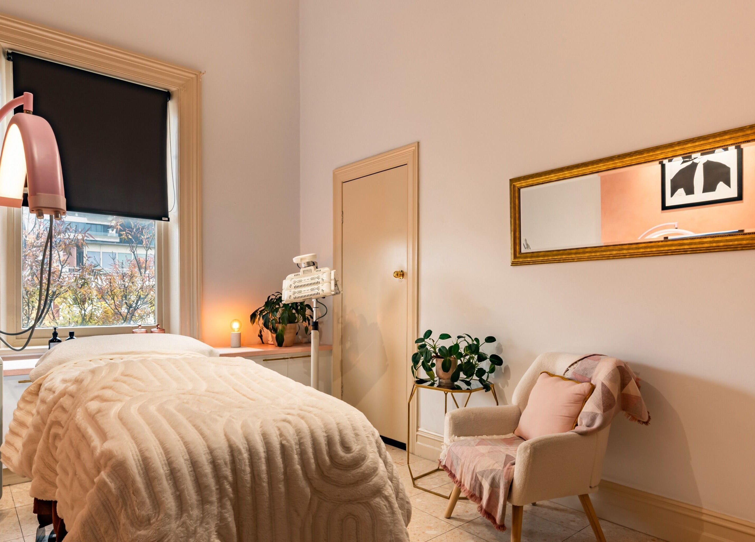 Luxurious spa room at Me Skin and Body, Melbourne, Victoria, AU, featuring cozy decor and soothing ambiance.