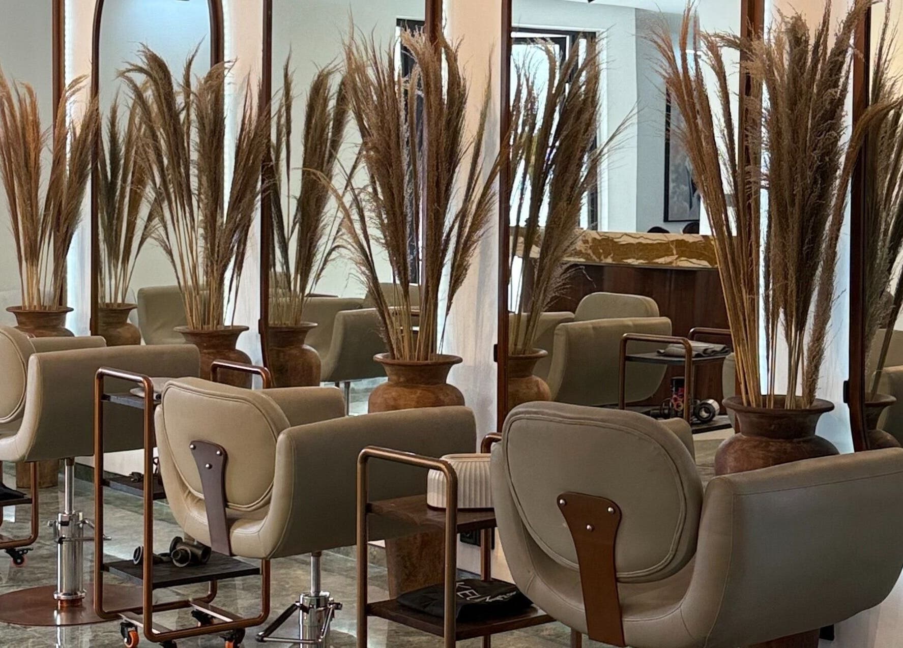 Elegant salon interior at Shaz Salon Beauty Wellness, featuring chic chairs and decor in Bali, Bali, ID.