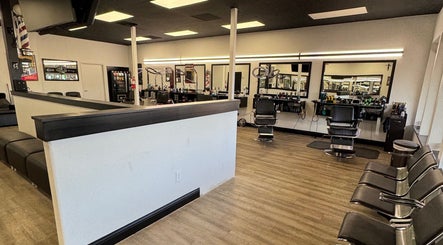 Modern barber chairs and mirrors at Ruben Carreon in Yuba City, California, US showcasing a stylish interior.