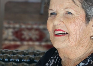 Elderly person smiling warmly at Innermost Wellbeing, Cape Town, Western Cape, ZA.