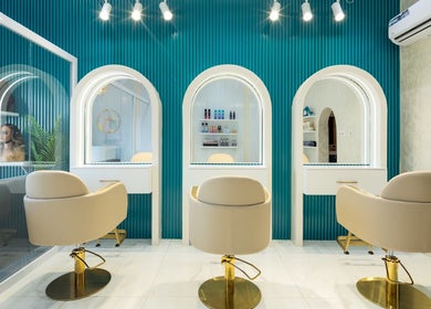 Adem Only salon interior with stylish chairs and mirrors in Tesano, Greater Accra Region, GH.