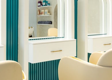 Luxurious styling station at Adem Only, Tesano, Greater Accra Region, GH, featuring elegant seating and modern decor.