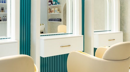 Luxurious styling station at Adem Only, Tesano, Greater Accra Region, GH, featuring elegant seating and modern decor.