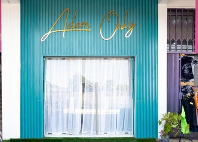 Front entrance of Adem Only in Tesano, Greater Accra Region, GH with vibrant colors and stylish decor.
