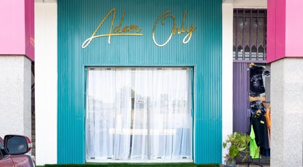 Front entrance of Adem Only in Tesano, Greater Accra Region, GH with vibrant colors and stylish decor.