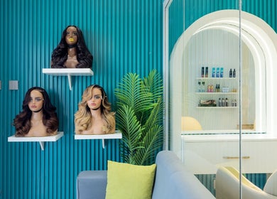 Elegant wig displays at Adem Only, Tesano, Greater Accra Region, GH, showcasing modern beauty decor.
