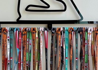 Colorful ribbons hanging on a wall at Aura salon & spa, Al janabiyah, Al-muḥāfaẓat Aš-šamālīyah, BH.