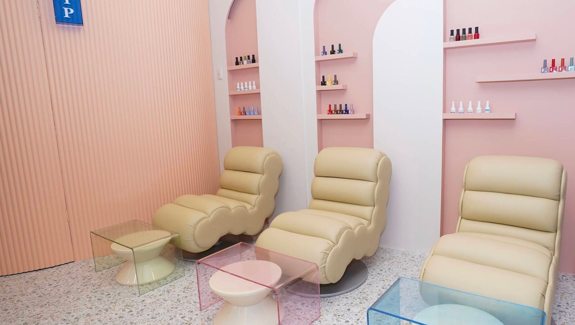 Stylish pedicure chairs at Lunch Break Beauty in Makati, Metro Manila, PH, showcasing a plush, relaxing ambiance.