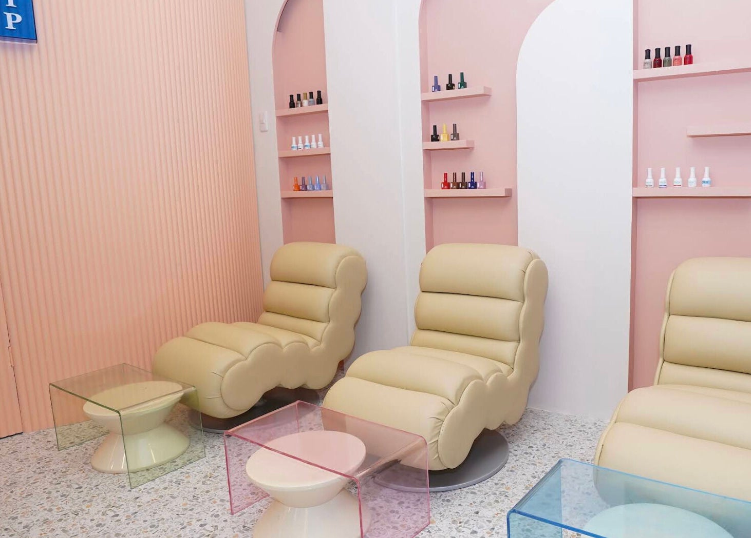 Stylish pedicure chairs at Lunch Break Beauty in Makati, Metro Manila, PH, showcasing a plush, relaxing ambiance.